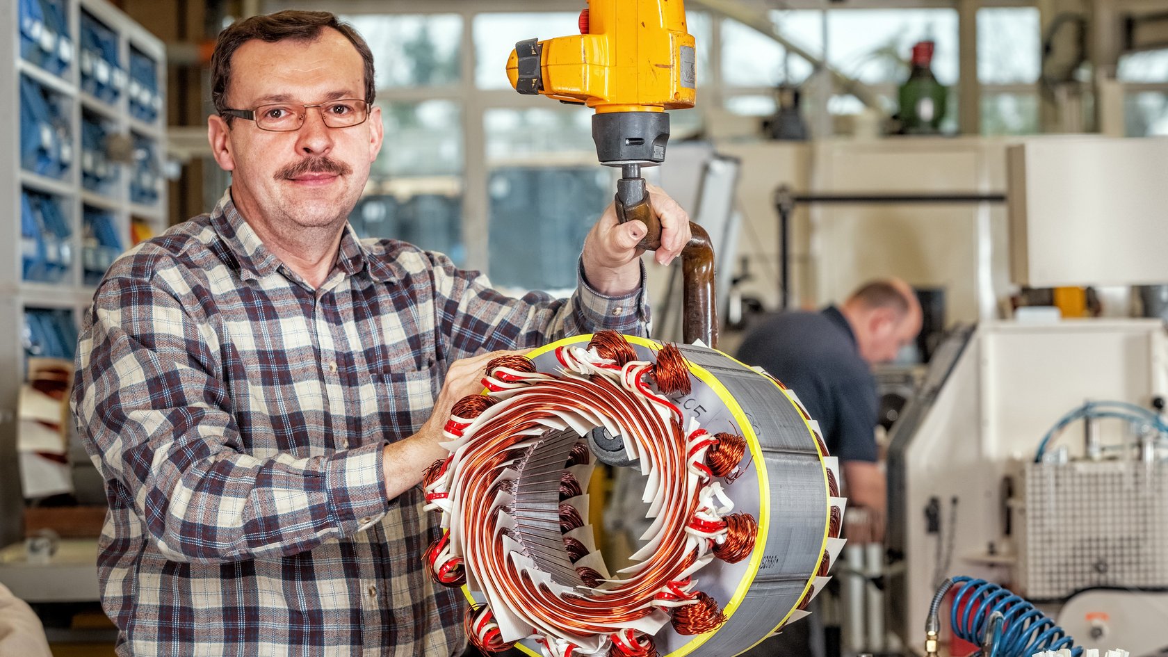 Wirtschaftsakteur mit Elektromotor