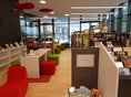 Mediathek am Teuringer, Oberteuringen Bibliotheksraum der Mediathek am Teuringer, Oberteuringen, mit weißen Regalen, bunten Sitzmöbeln