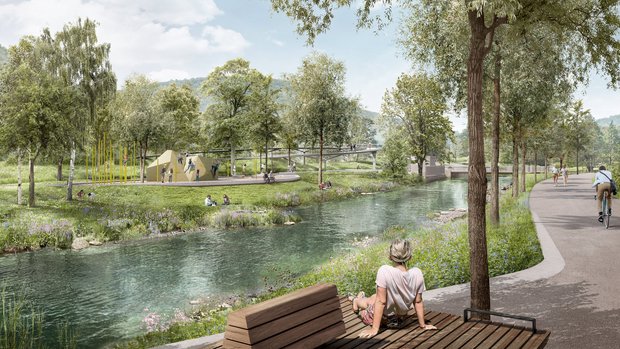 Visualisierung Gartenschau Bad Urach Eine Frau sitzt entspannt auf einer Bank an einem kleinen Fluss. Um Sie herum stehen viele Bäume, im Hintergrund ist ein kleines Stück einer Fußgängerbrücke zu erkennen.